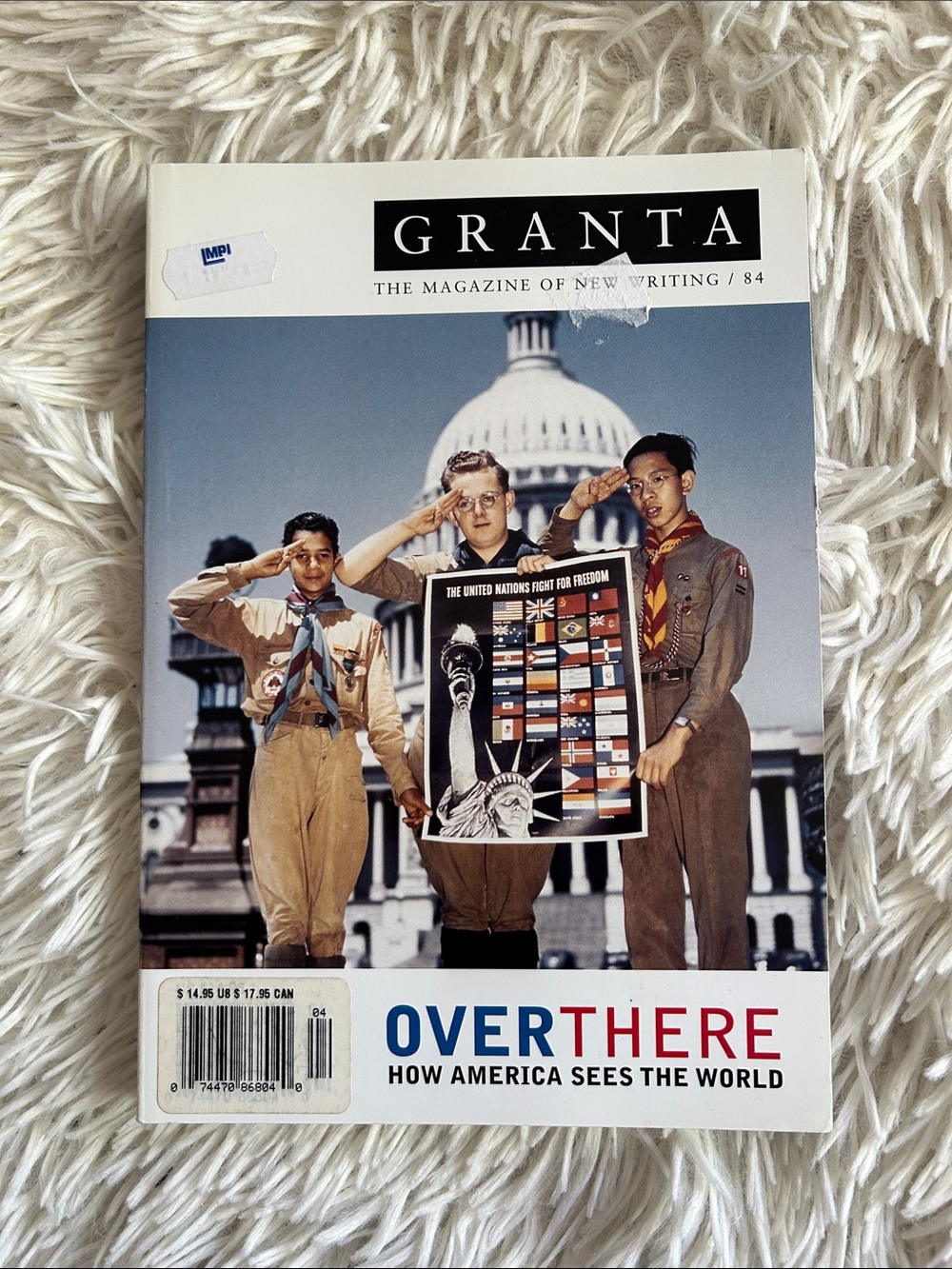 GRANTA 84 Over There, magazine cover with blue globe and red accents
